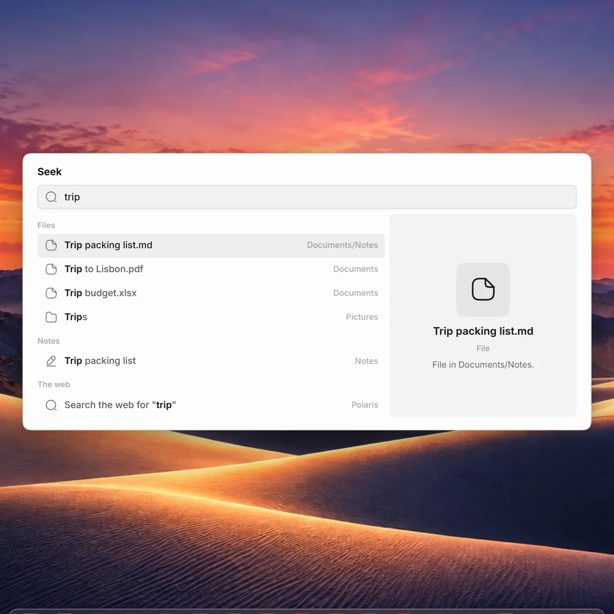 Seek open over the desk, finding files and a note for “trip”.